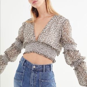 Long sleeved ruffled crop top.